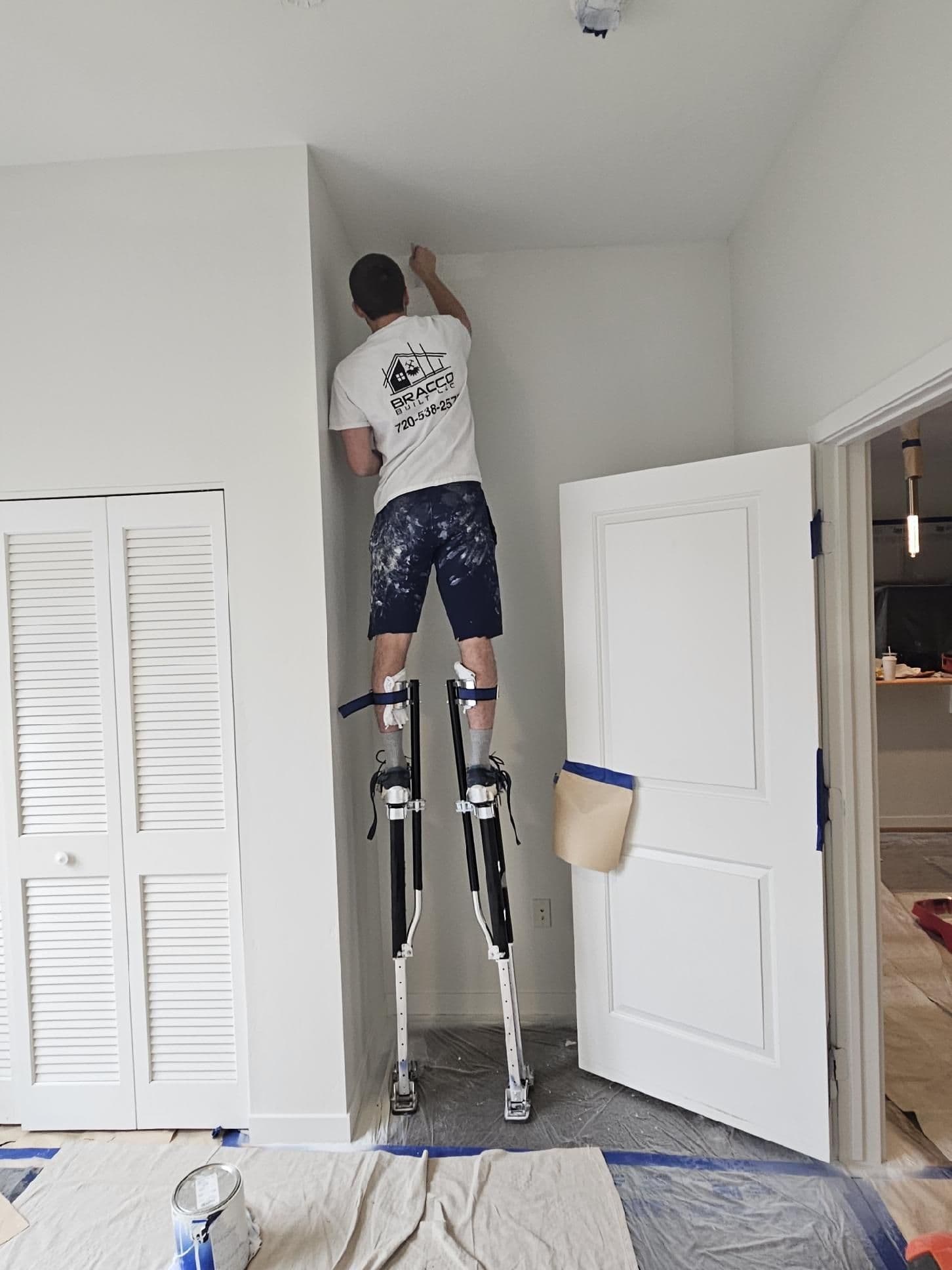 Expert Precision in High-Reach Painting image